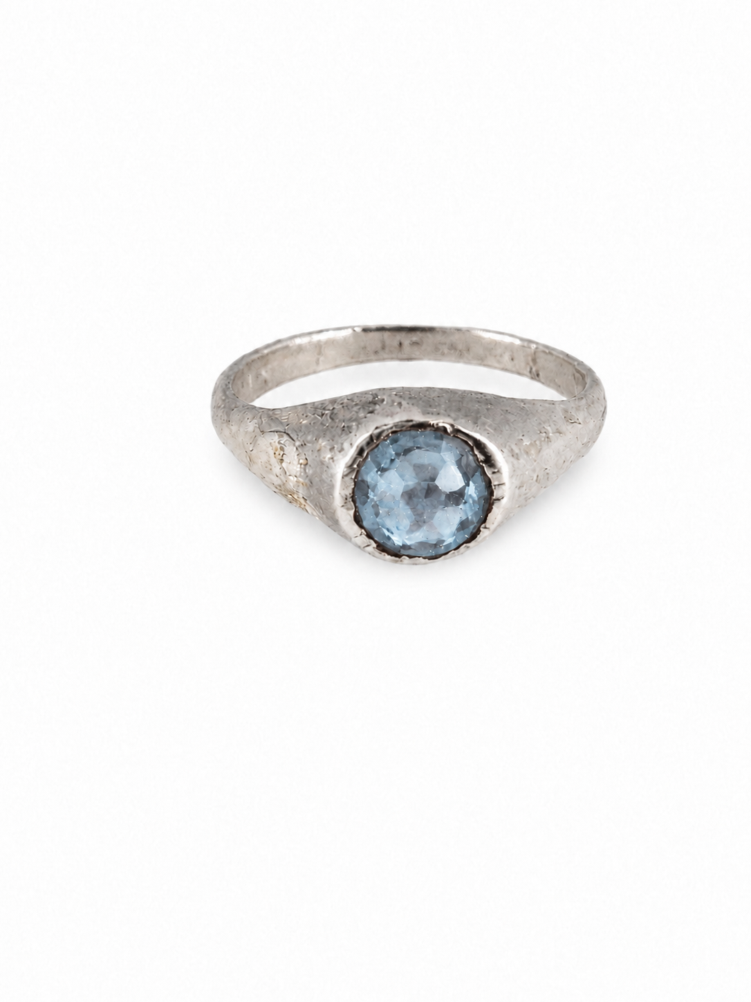 Platinum medieval pale blue topaz stirrup ring from East Yorkshire, with hand-cut gemstone