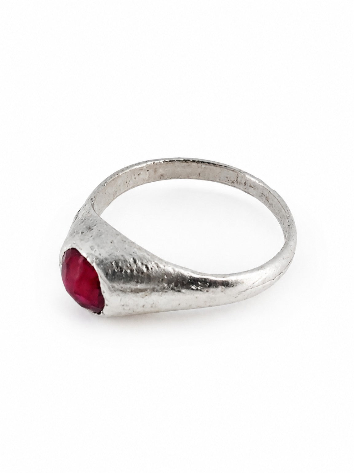 Platinum East Yorkshire medieval ruby stirrup ring showing the raised cabochon setting and handmade surface