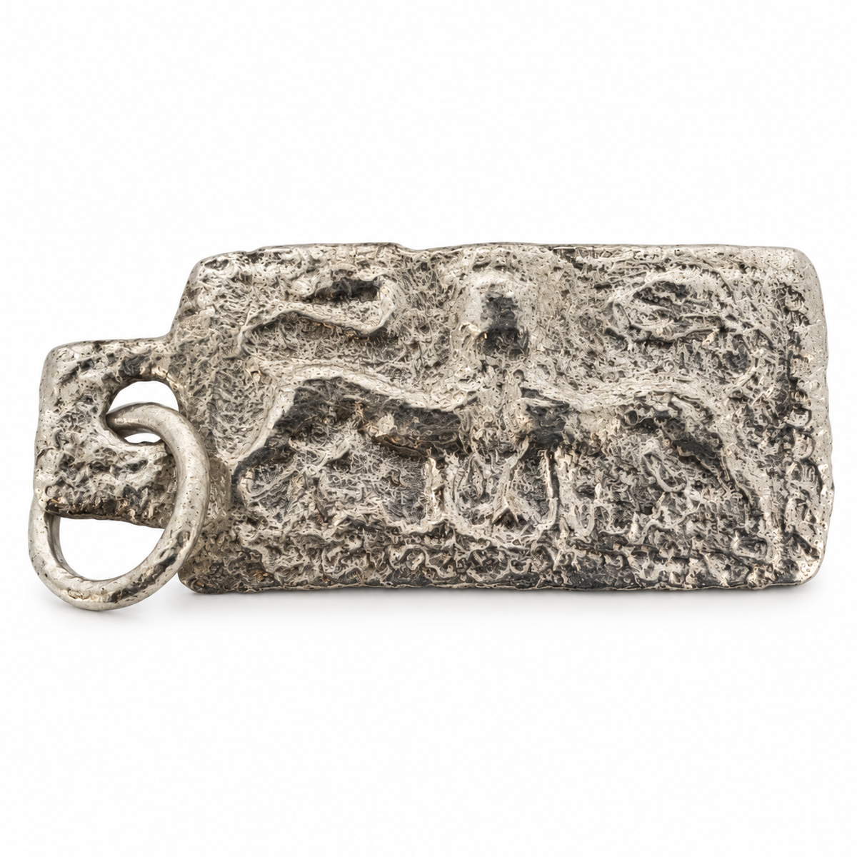 Silver early medieval bicorporate lion pendant from Hertfordshire, front view.