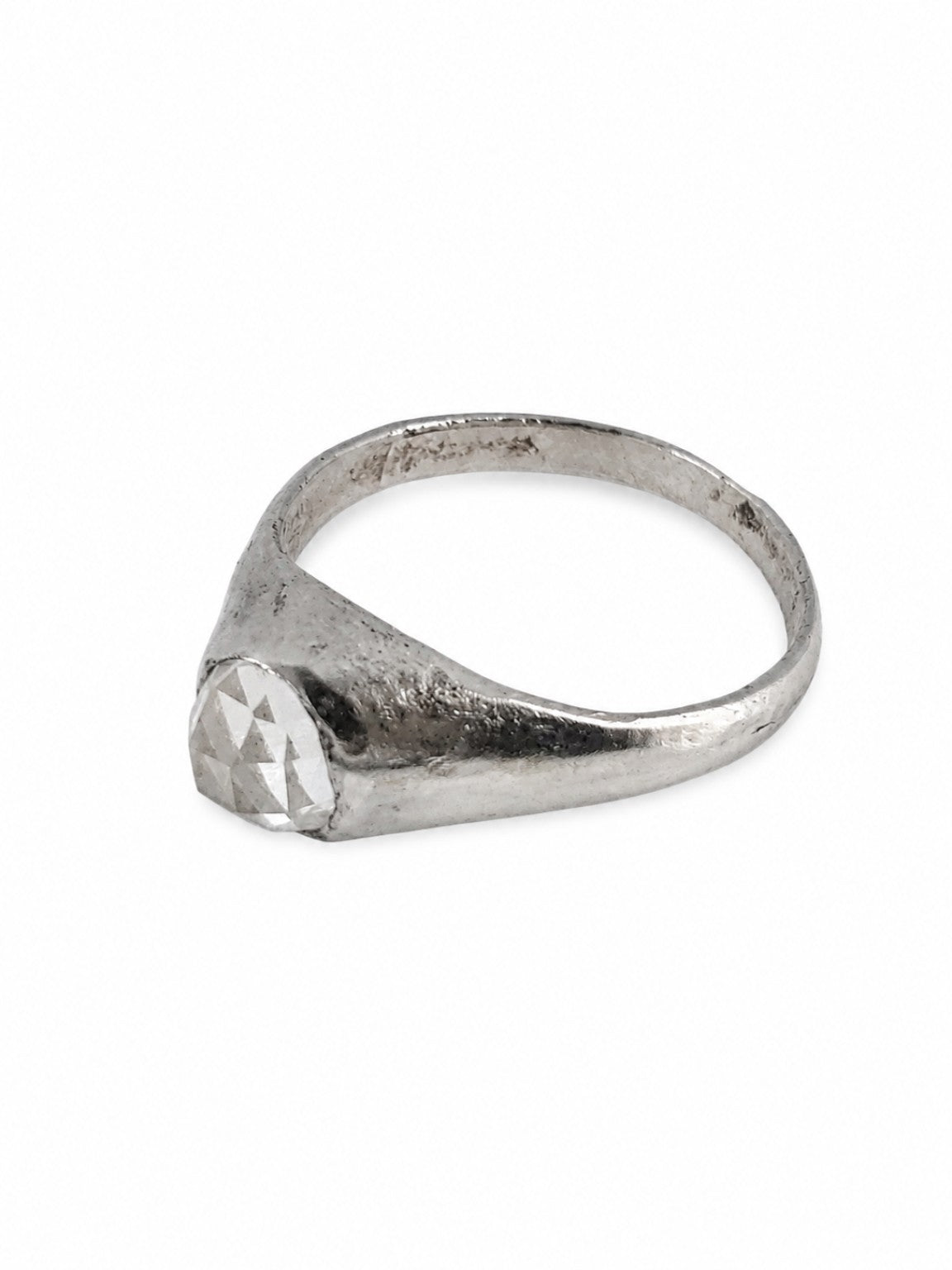 Platinum East Yorkshire medieval stirrup ring showing its raised 6mm rose-cut diamond setting and handmade surface