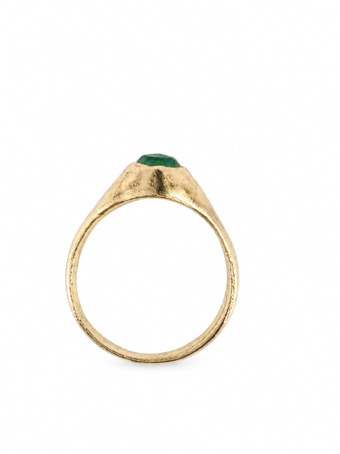 Gold East Yorkshire medieval emerald stirrup ring showing the elevated cabochon profile and slender band