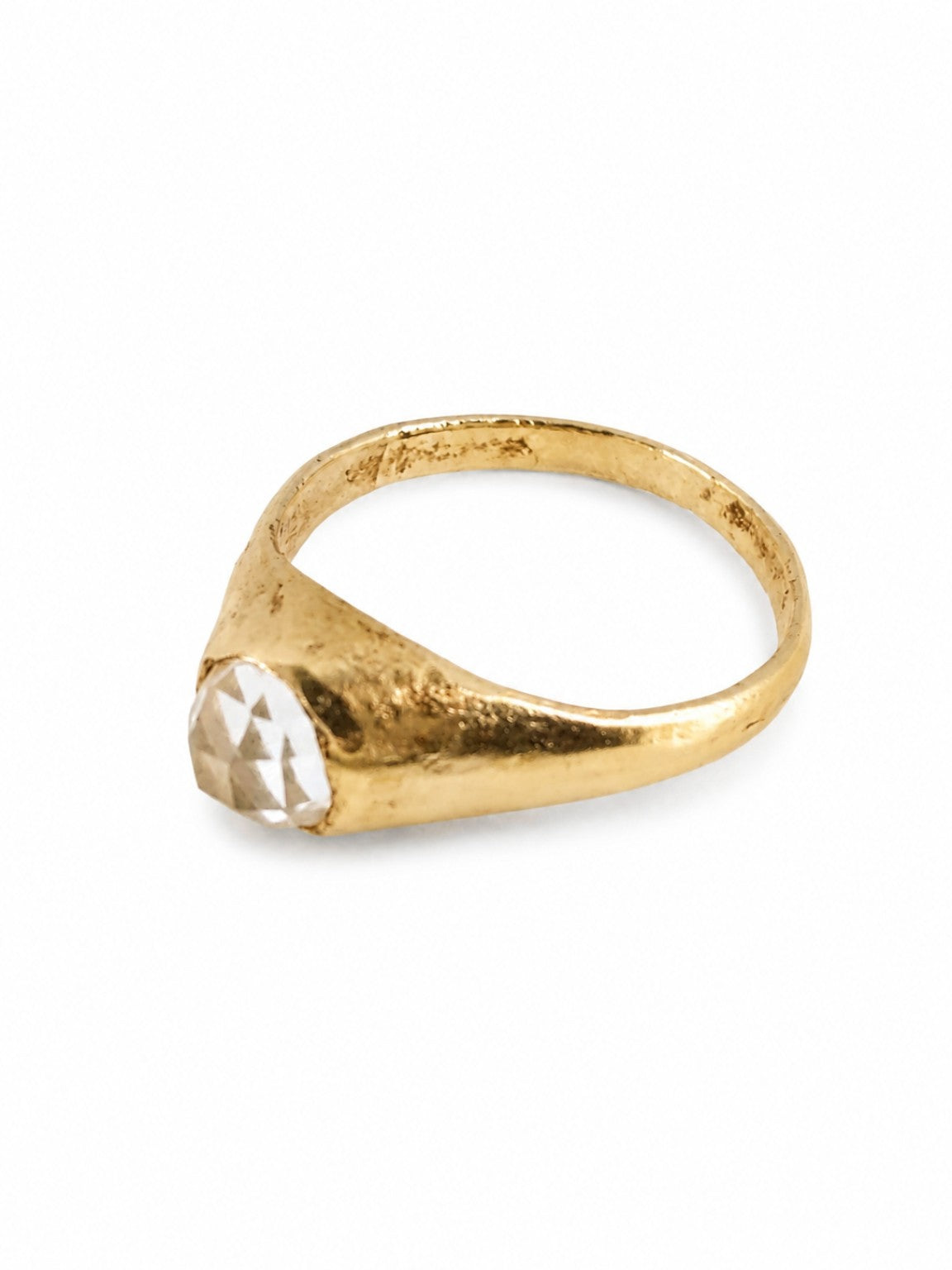 Gold East Yorkshire medieval stirrup ring showing its raised 6mm rose-cut diamond setting and handmade surface