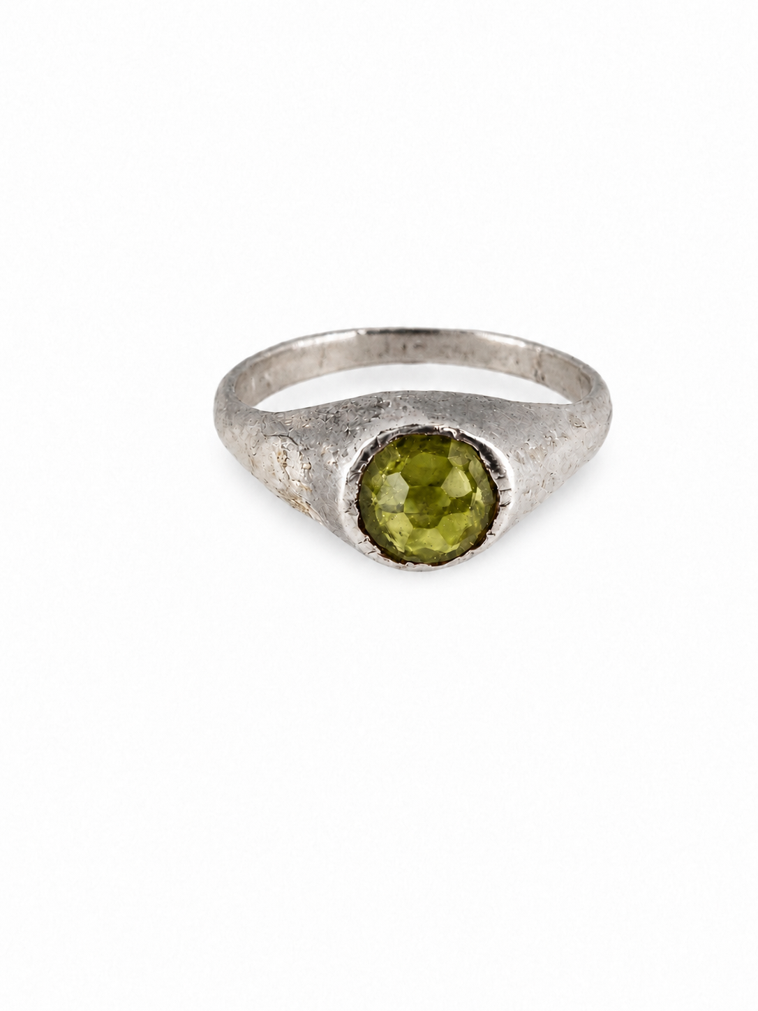 Platinum medieval peridot stirrup ring from East Yorkshire, with hand-cut gemstone