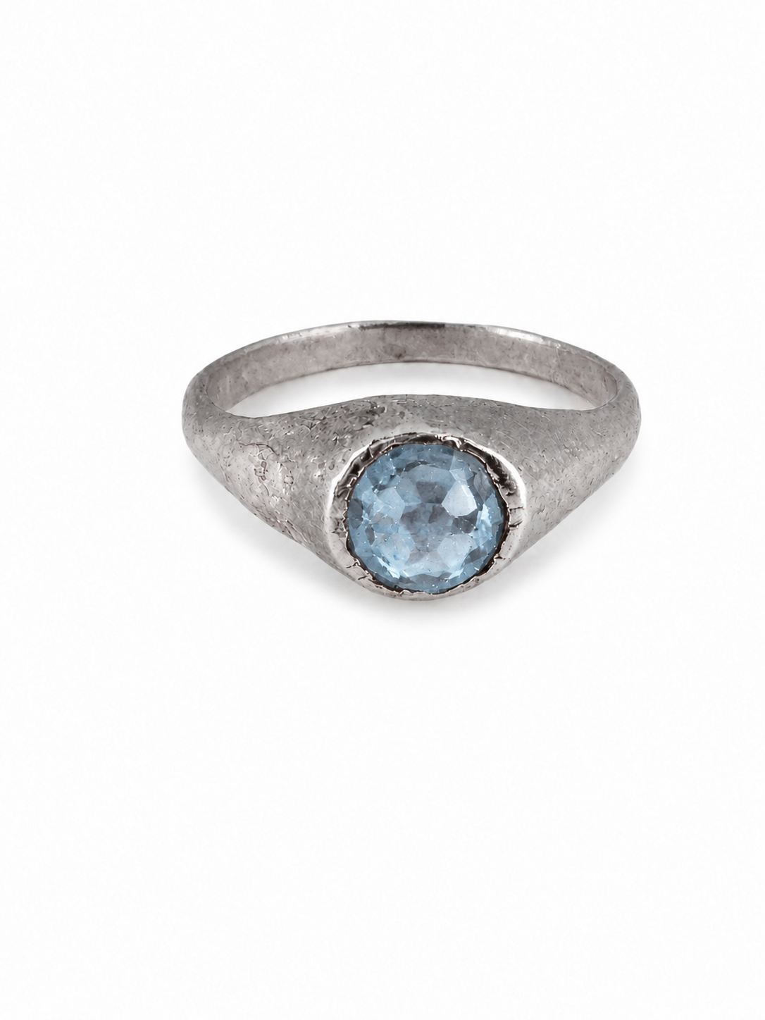 Silver medieval pale blue topaz stirrup ring from East Yorkshire, with hand-cut gemstone