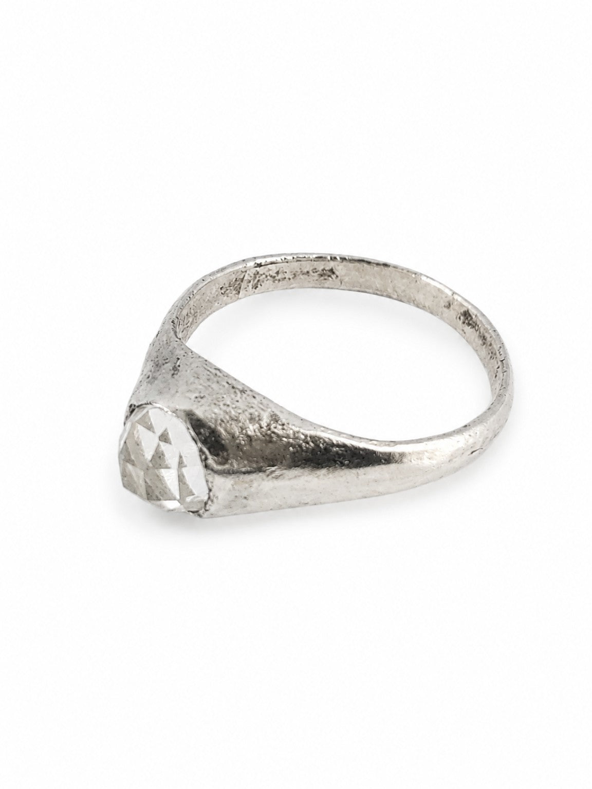Silver East Yorkshire medieval stirrup ring showing its raised 6mm rose-cut diamond setting and handmade surface