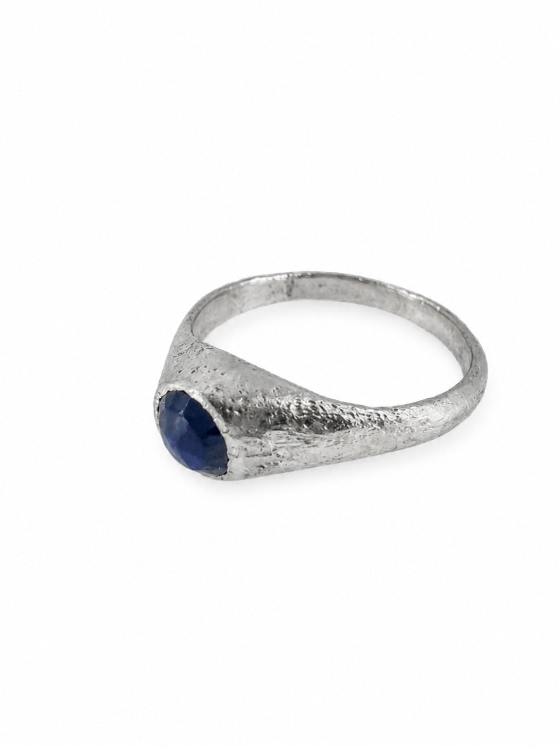 Platinum East Yorkshire medieval sapphire stirrup ring showing the raised gemstone setting and handmade surface