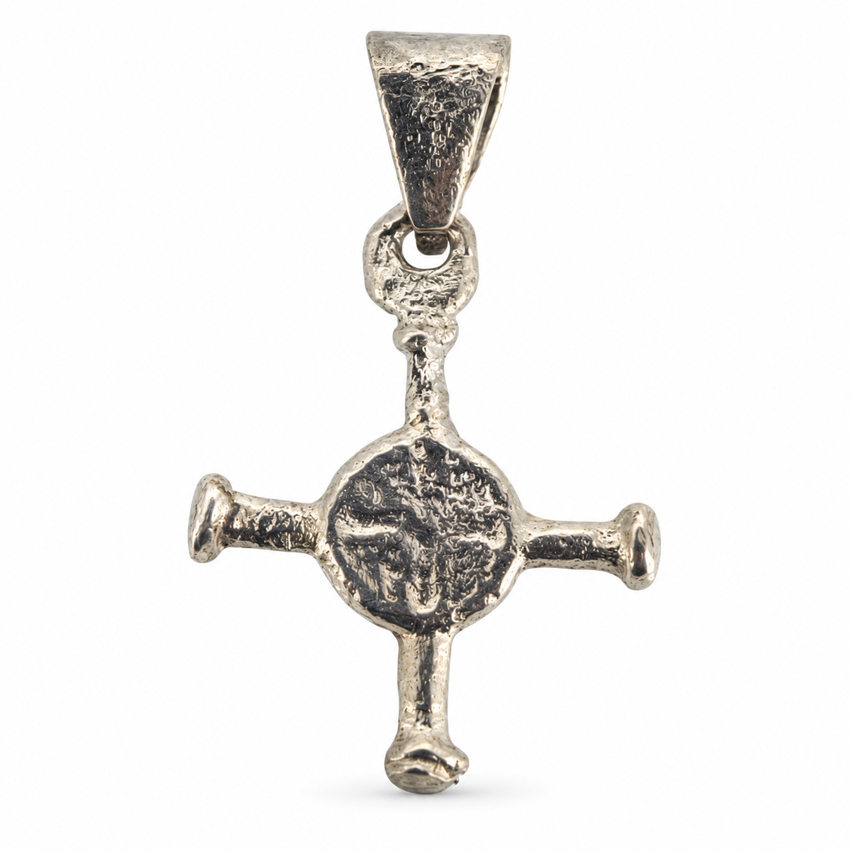 Silver Anglo-Saxon cross pendant from Northumbria, front view.