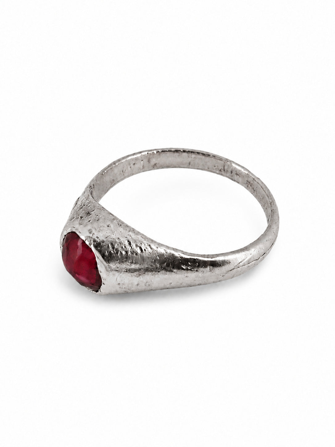 Silver East Yorkshire medieval ruby stirrup ring showing the raised cabochon setting and handmade surface