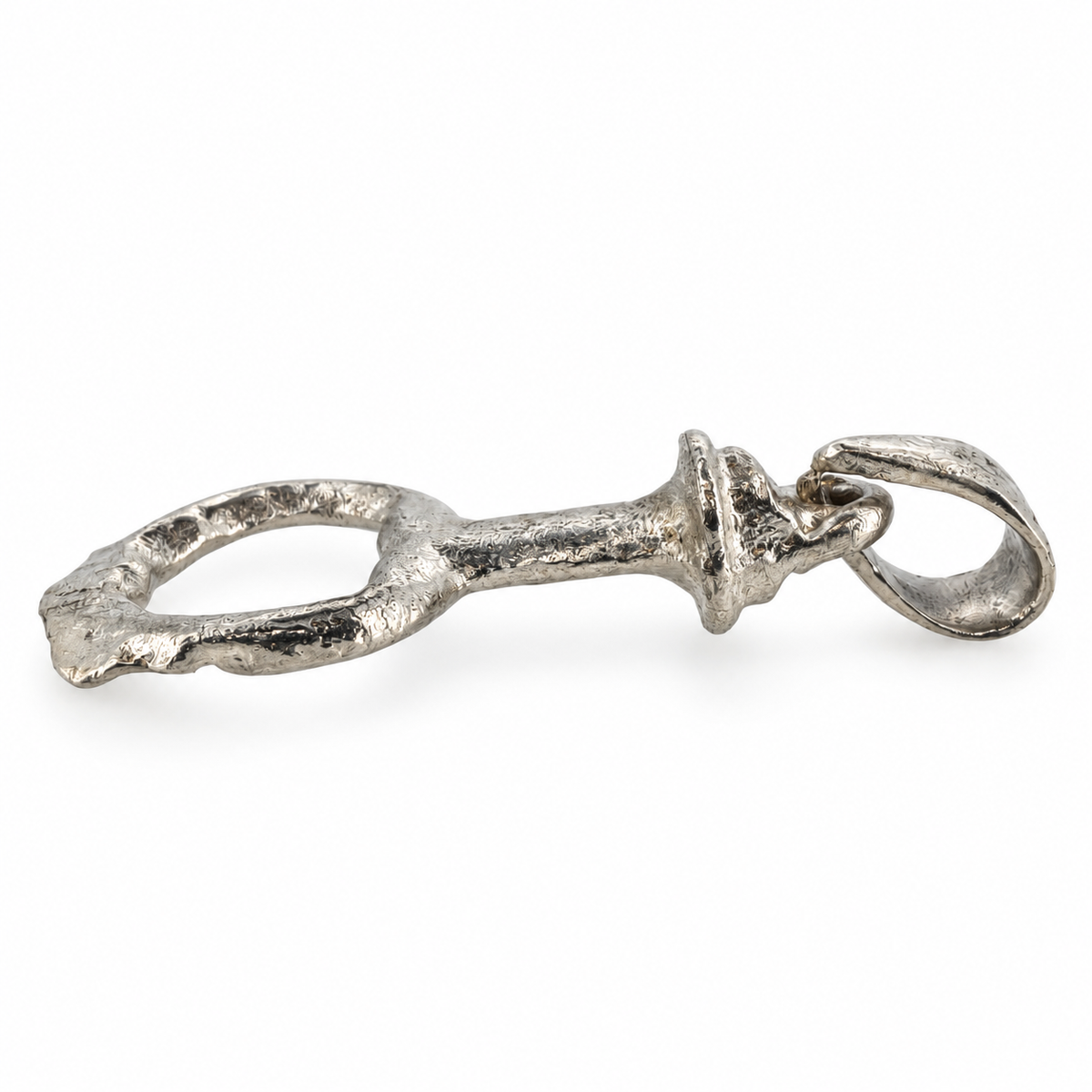 Silver Tudor purse fob pendant from Lincolnshire, angled view.