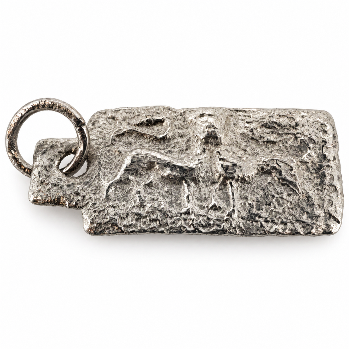 Platinum early medieval bicorporate lion pendant from Hertfordshire, front view.